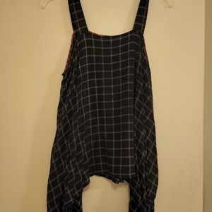 Black strap top with asymmetrical hem